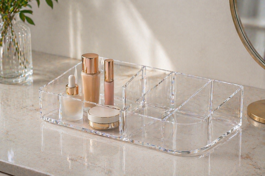 Open acrylic organizer with items placed for minimal reach and easy access.