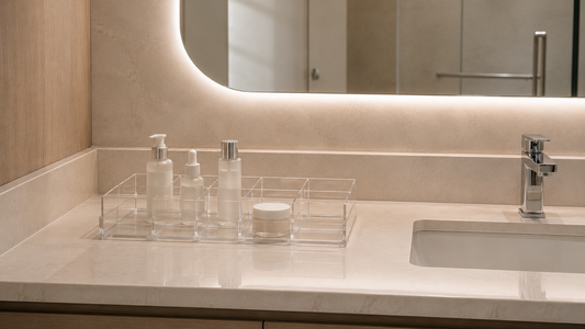 Bathroom vanity organizer with spaced skincare products and open countertop layout.