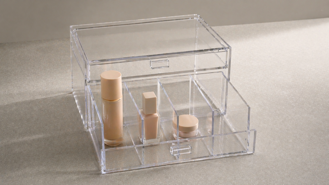 Deep acrylic drawer with vertical dividers organizing tall, medium, and compact items in separate sections for efficient storage.