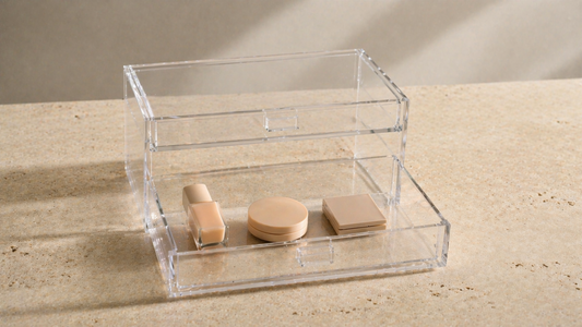 Acrylic drawer with foundation, compact, and palette arranged in a front-facing sequence with spacing for fast daily makeup access.