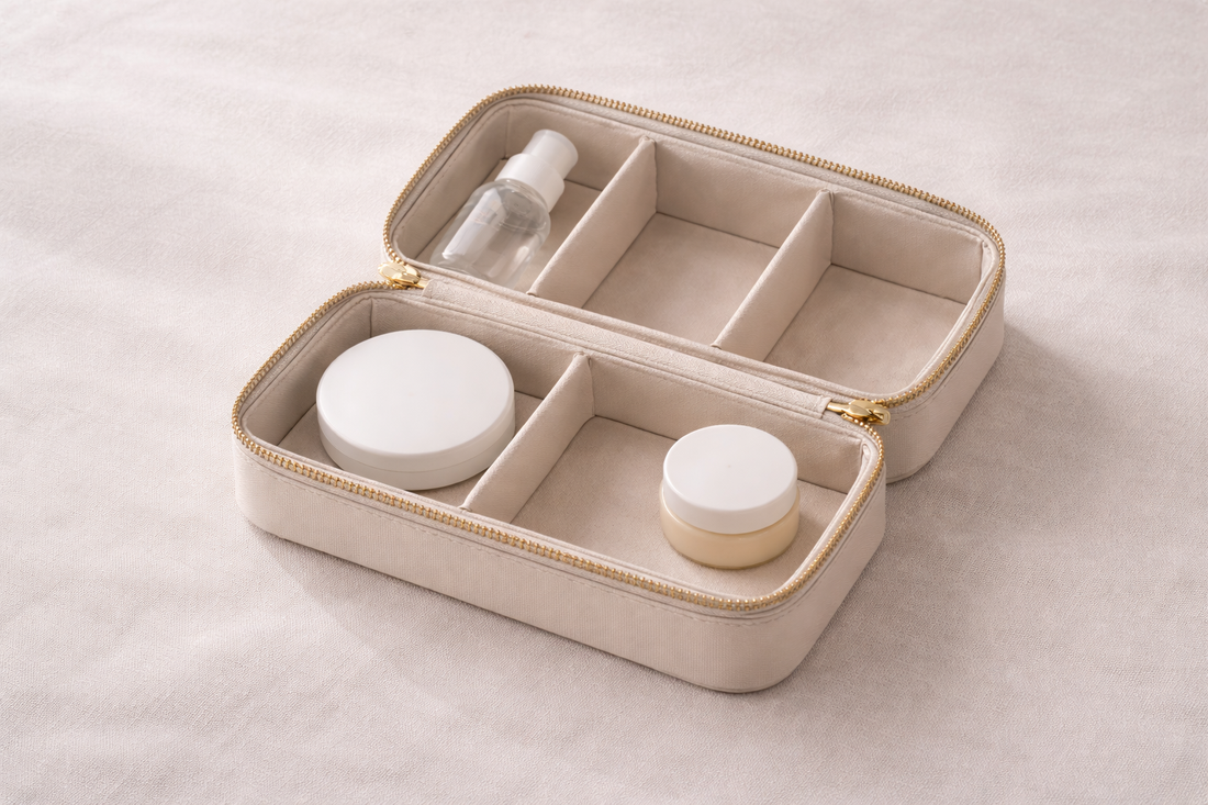 Travel organizer with only 3 essential items and one empty space, creating a minimal packing setup that feels complete without adding more.