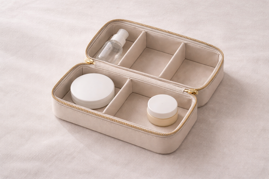 Travel organizer with only 3 essential items and one empty space, creating a minimal packing setup that feels complete without adding more.
