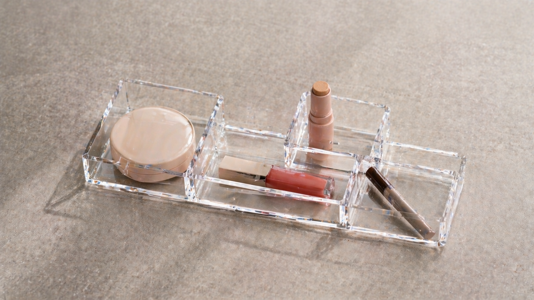Linear makeup organizer with only essential items and one empty space, creating a clean daily setup that feels complete without adding more.