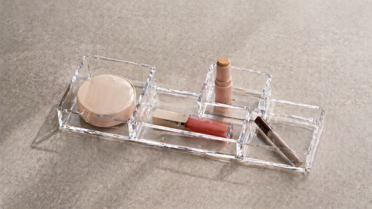 Linear makeup organizer with only essential items and one empty space, creating a clean daily setup that feels complete without adding more.
