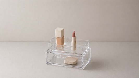 Makeup storage system with structured layout and spacing.
