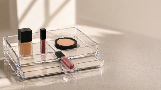 Acrylic makeup organizer with three essential items showing structured minimal setup for faster routines