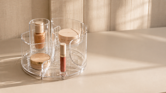 Makeup organizer with separated sections for daily makeup access and visibility.