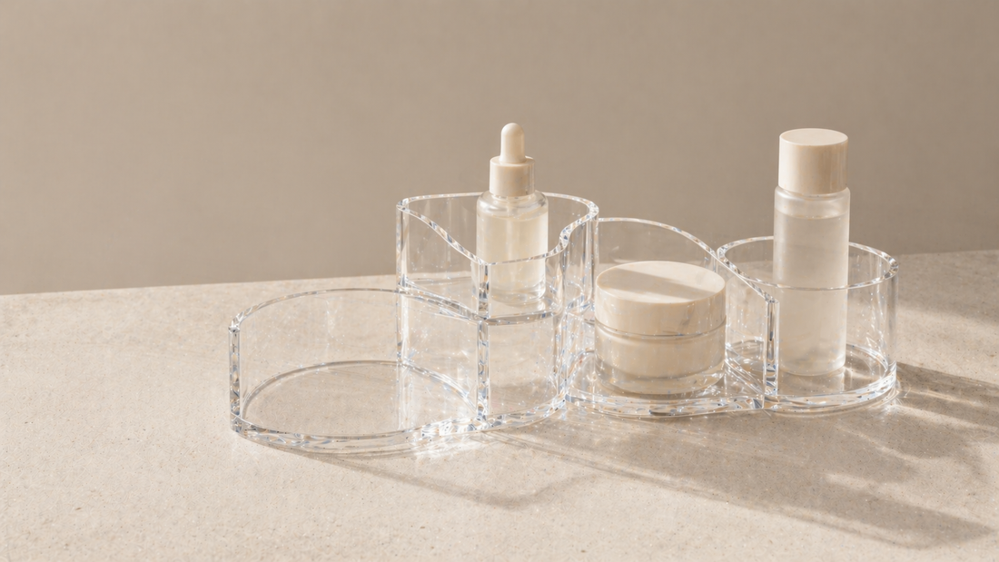 Minimal skincare organizer with only essential items grouped by type and one empty space, showing a complete routine without needing more products.