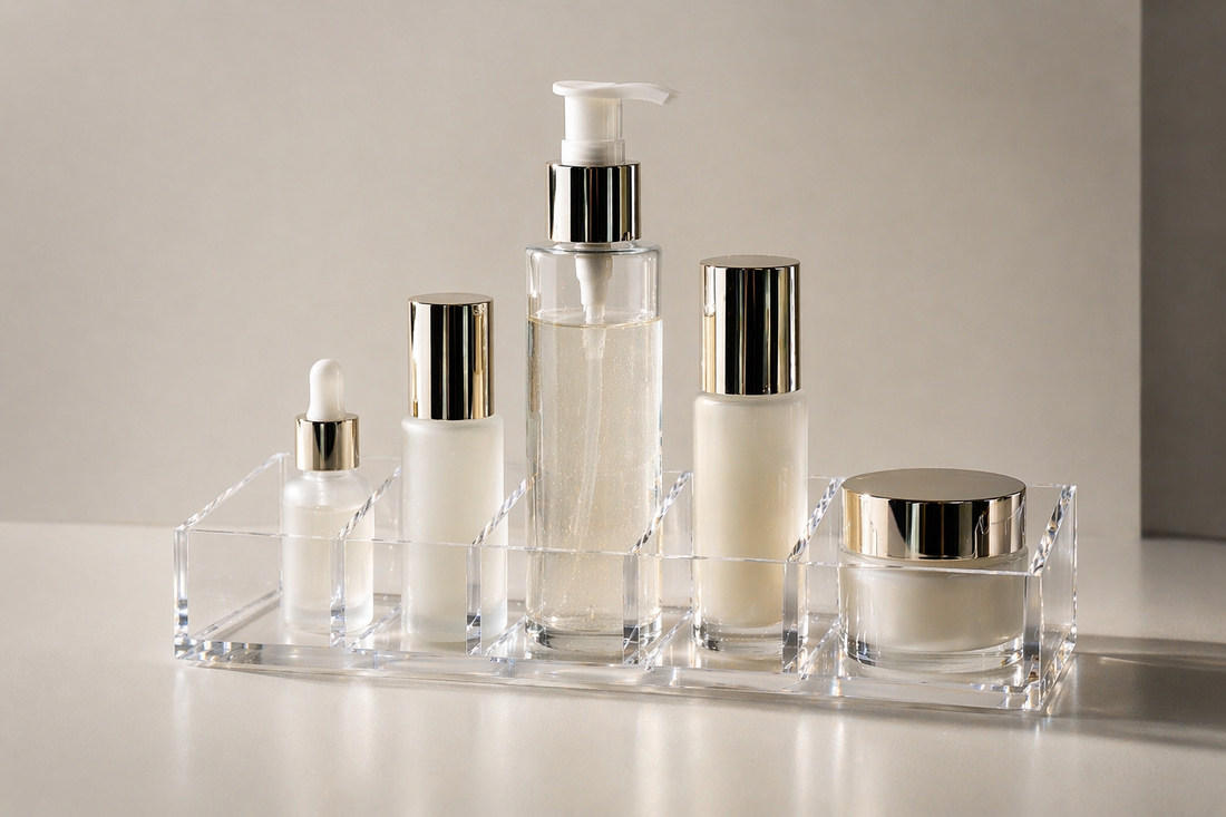 Clear acrylic skincare organizer with evenly spaced items maintaining stable daily routine flow and consistent placement.