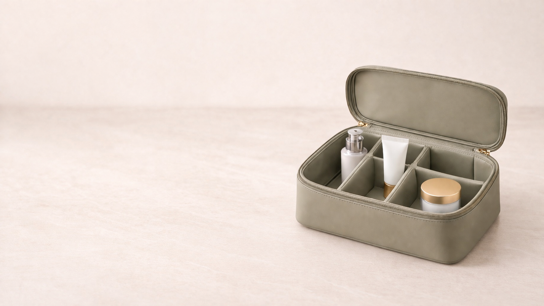 Premium travel makeup organizer with bottle, tube, and jar arranged in separated compartments for efficient packing.