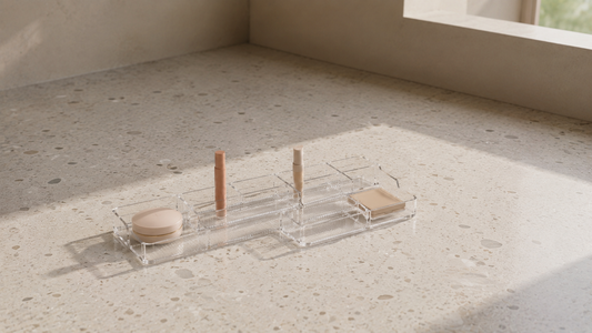 Makeup storage organizer with structured compartments for organized vanity layouts.