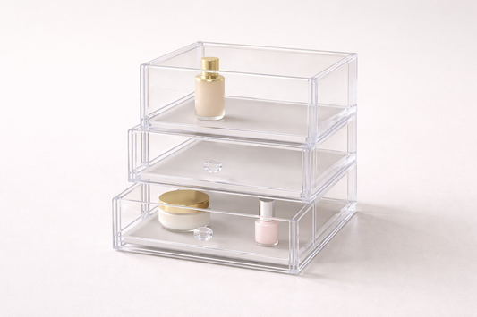 Multi-layer acrylic drawers with minimal items and visible gaps enhancing clarity and quick recognition.