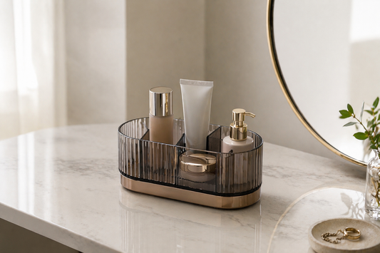 compact makeup storage with ribbed acrylic organizer holding 4 distinct items in separated zones on a small vanity surface with clear spacing