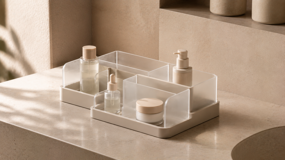 Bathroom vanity organizer with separated skincare compartments and reduced bottle movement.