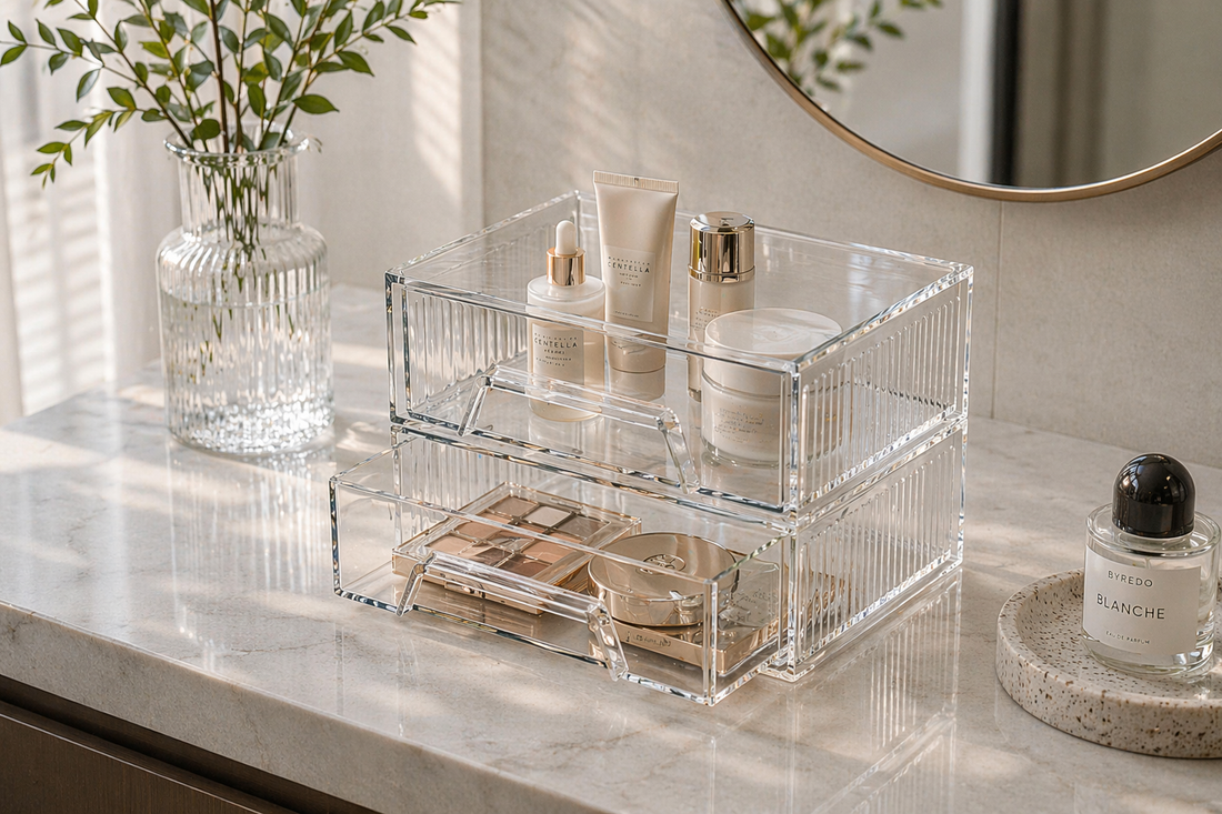 Drawer organizer with minimal items arranged in a controlled layout.