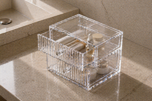Clear acrylic drawer showing evenly spaced items for fast visual selection without overlap.