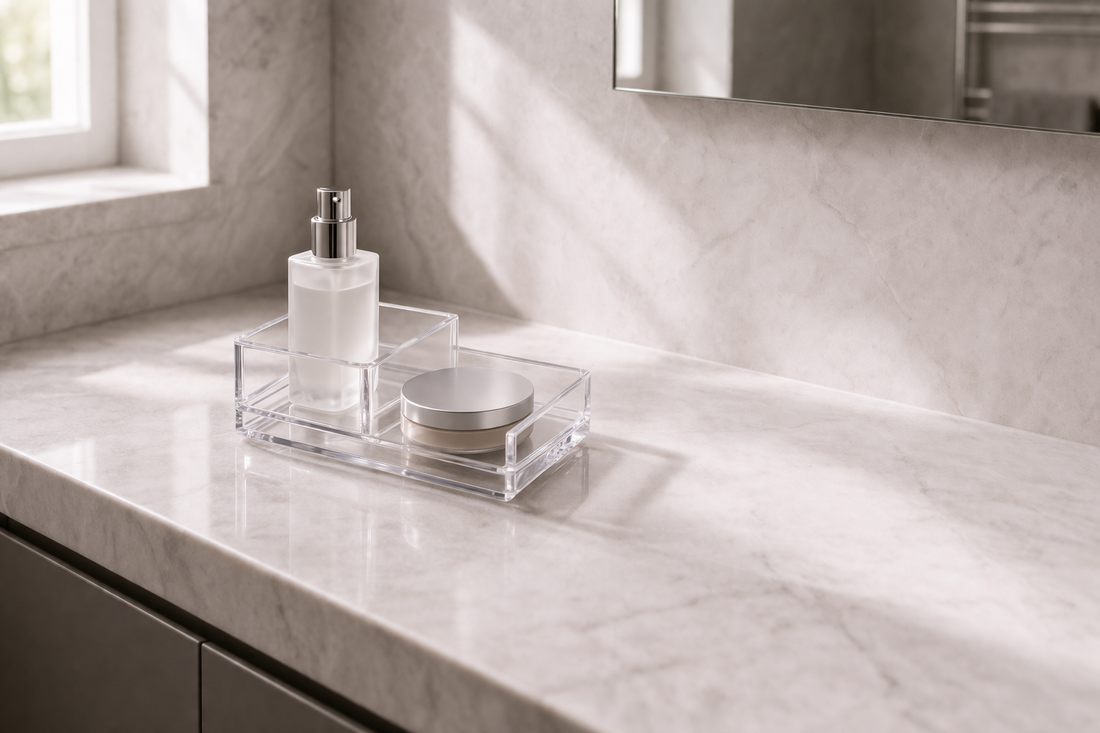 Efficient vanity setup for small spaces using a compact tiered acrylic organizer on a bathroom counter