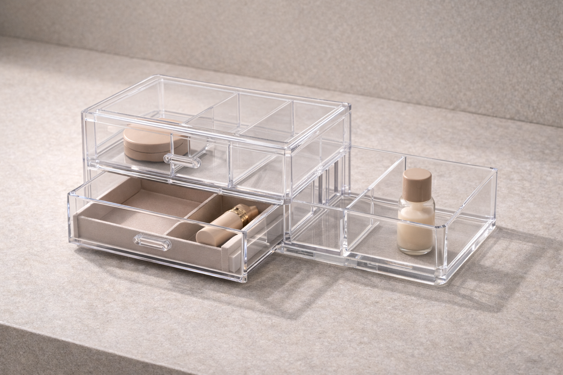 Clear acrylic drawer organizer with two stacked pull-out drawers and extended side section showing adjustable storage structure