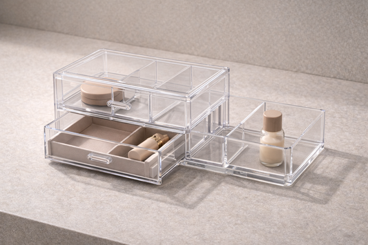 Clear acrylic drawer organizer with two stacked pull-out drawers and extended side section showing adjustable storage structure