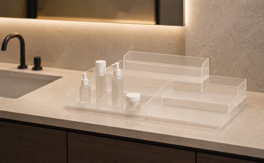 Bathroom vanity storage organizer with visible skincare products and open access spacing.