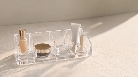 Makeup organizer divided into functional zones to minimize movement during use.