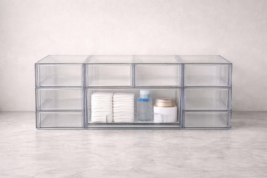 Acrylic drawer organizer with one grouped section and empty compartments highlighting clear separation and fast workflow access.