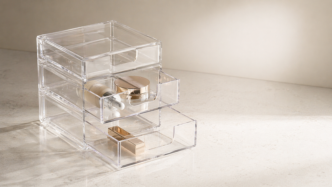 Tiered acrylic drawer system with minimal items placed across layers for clear visual access.