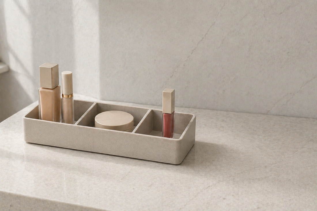 Makeup organizer divided into compartments by product category.