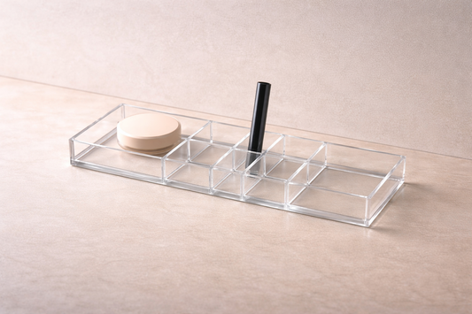 Clear drawer-style acrylic organizer featuring a visibly taller top drawer and vertical divider to reduce search time.