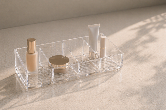 Minimal makeup organizer with structured spacing creating a stable and calm routine environment.