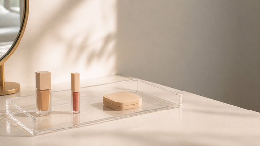 Clear makeup organizer with three items spaced widely to maintain low density and consistent layout