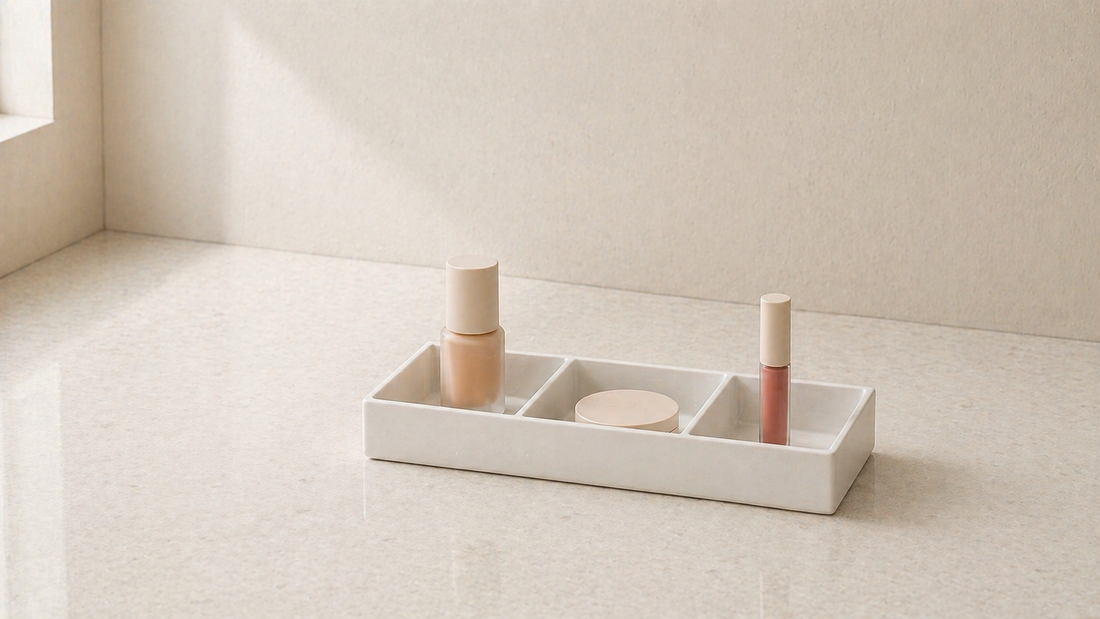 Minimal makeup organizer with limited items and large empty space.