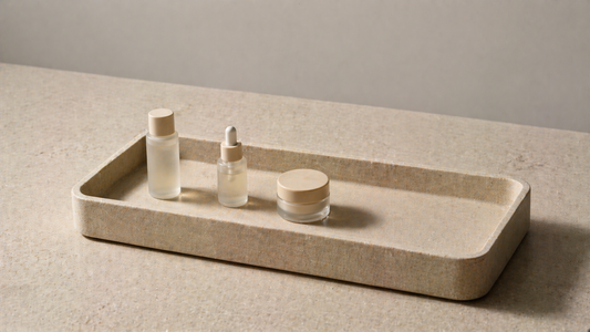 minimal skincare tray with clear empty space and limited items to control clutter