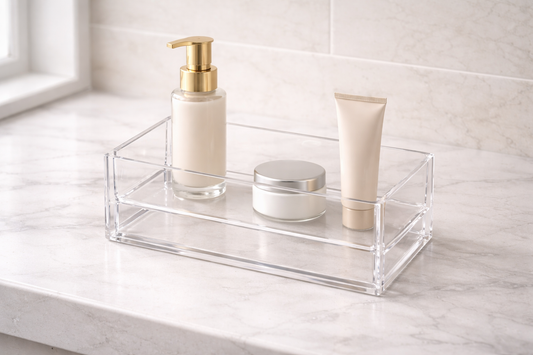 Acrylic organizer with 3 items arranged in a front-to-back flow to minimize reach and support smooth routine movement.