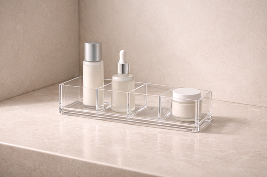 Clear acrylic skincare organizer showing 3 items in fixed positions with one empty compartment, maintaining a stable and predictable setup with no need for adjustment.