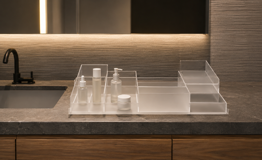 Bathroom vanity organizer with separated skincare products and open access spacing.