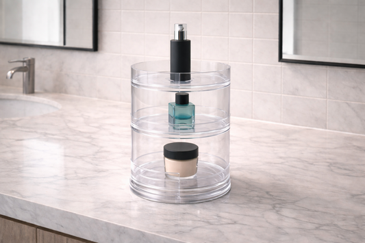 Three-tier rotating vanity organizer with separated items on each level reducing daily routine friction through structured placement