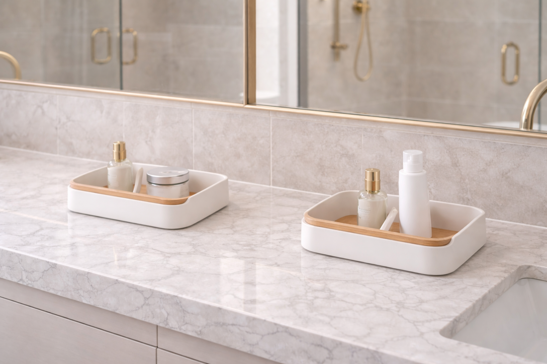 Shared bathroom vanity with divided storage zones for two users.