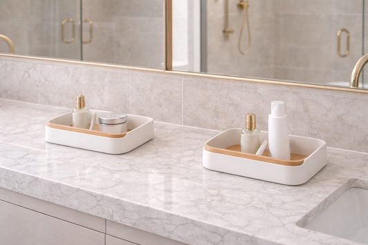 Shared bathroom vanity with divided storage zones for two users.