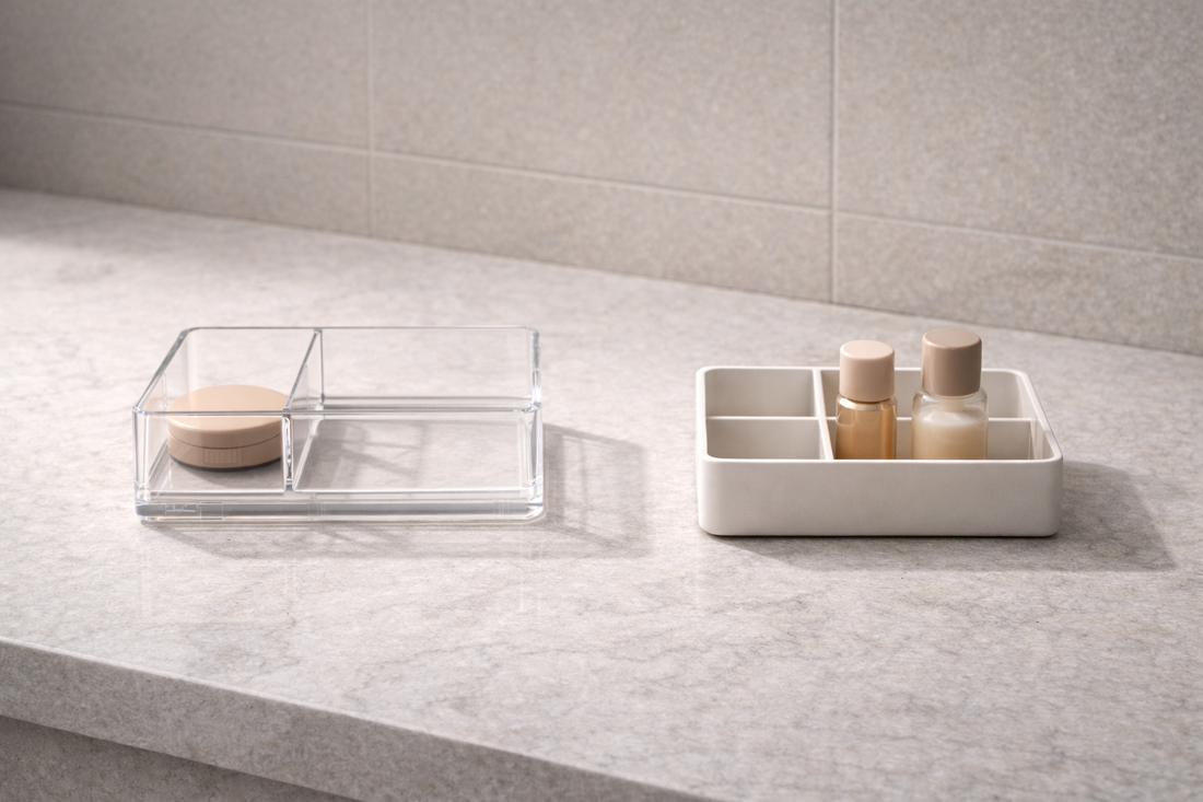 Two separate vanity organizers with distinct item groups and clear gap between zones showing personal storage separation