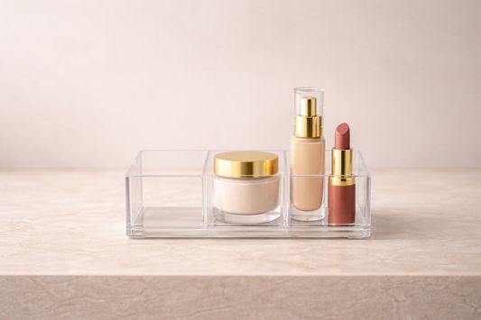 Clear acrylic makeup organizer showing 3 items with one empty compartment, maintaining a visually simplified setup with clear spacing and no need for adjustment.