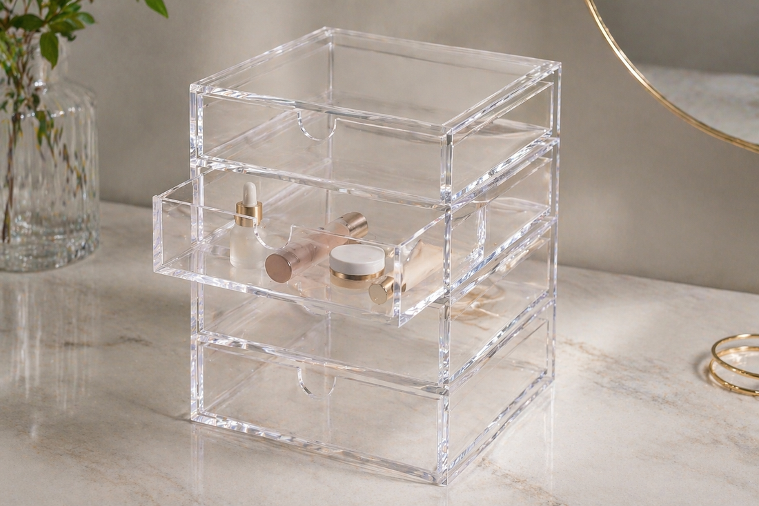One acrylic drawer used with grouped items while other drawers remain empty for controlled access.