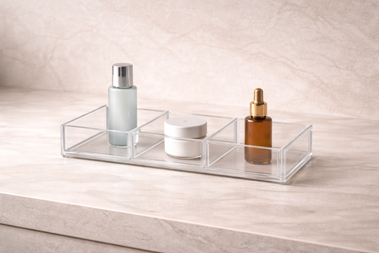 Skincare items evenly spaced in a divided organizer with visible gaps between compartments to support airflow and product stability