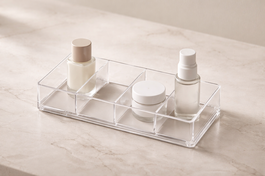 Skincare items placed in fixed compartments with equal spacing and one empty section showing consistent layout