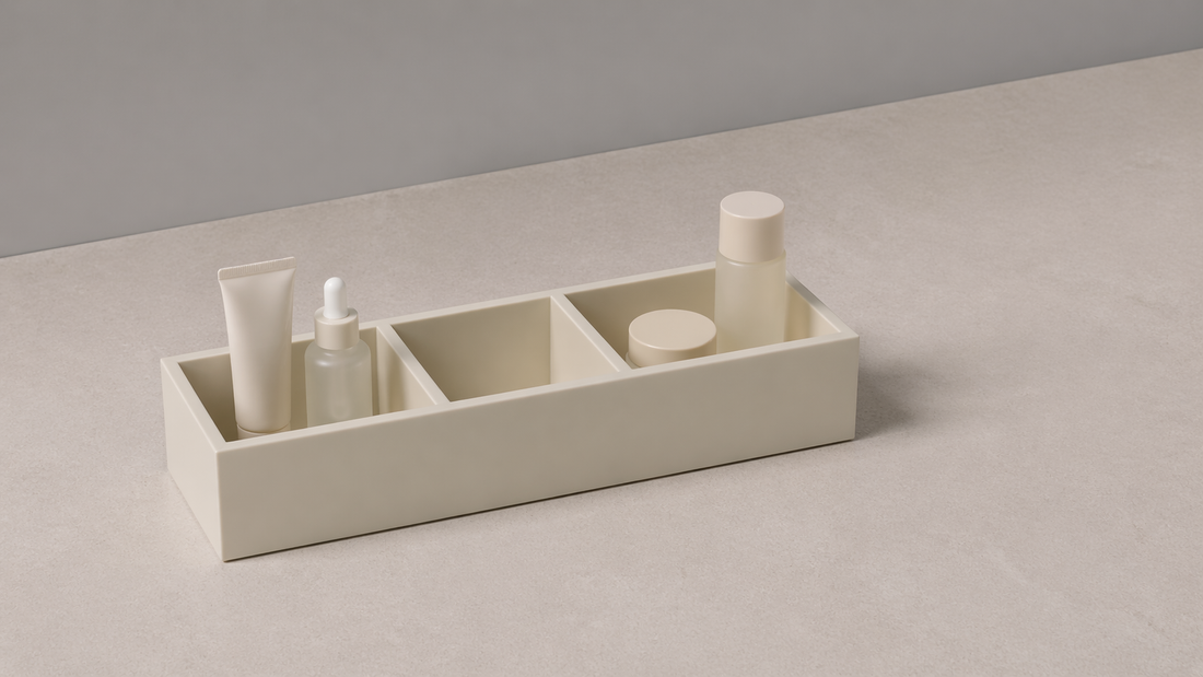 Skincare items separated into distinct user zones within an organizer