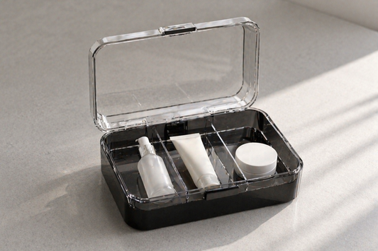 Structured travel organizer with separated compartments and minimal items for compact packing.