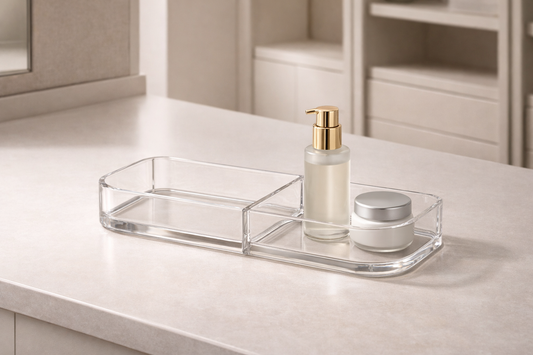 Time-saving skincare organization system with frosted white drawers and a serum bottle