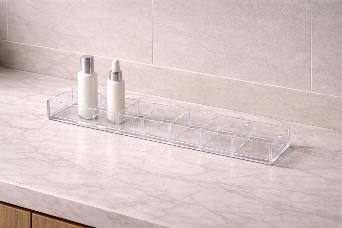 Polished thick acrylic edges of a drawer unit under soft natural daylight, focusing on structural visibility and clarity.