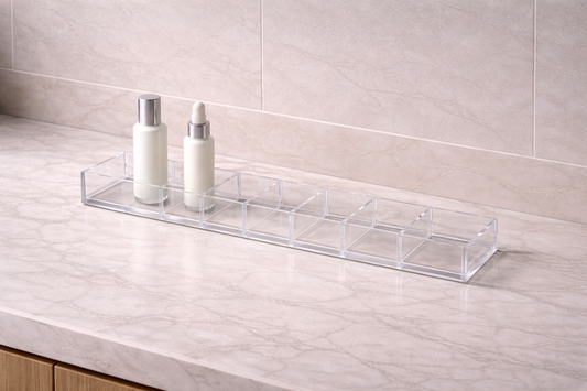 Polished thick acrylic edges of a drawer unit under soft natural daylight, focusing on structural visibility and clarity.