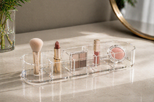 Makeup items spaced widely in a clear organizer to allow instant visual recognition.